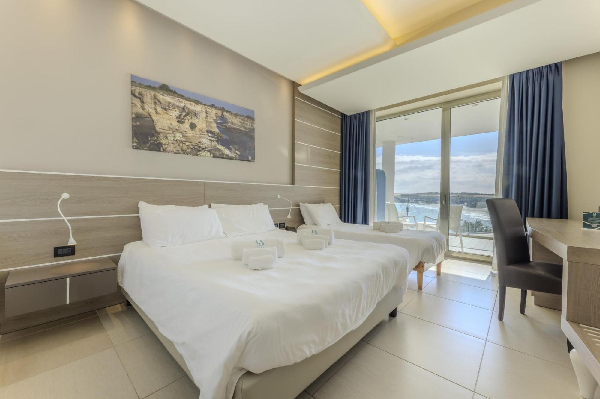 Hotel Belvedere Torre dell'Orso Camera foto